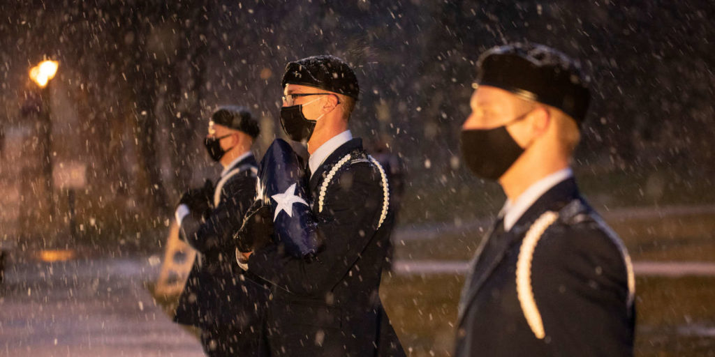 Members of Air Force ROTC Detachment 410 participate in the opening ceremony of a 24 hour vigil honoring military service members missing in action or prisoners of war on the lower quad in St. Paul on November 10, 2020.