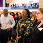 Special guest speaker Tarana Burke, founder of the “Me Too” movement and civil rights activist, is introduced in the O’Shaughnessy Educational Center Auditorium in March. Liam James Doyle/University of St. Thomas