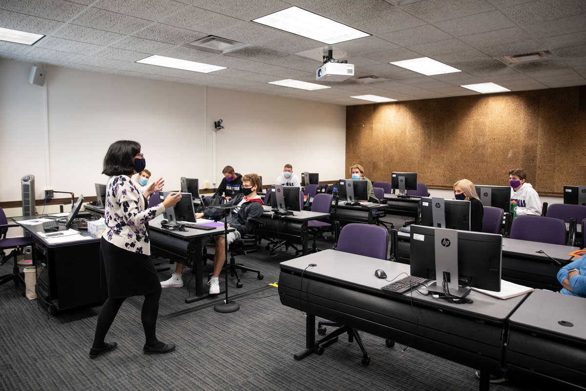 Professor Monica Hartmann teaches and Economics class in O’Shaughnessy Education center during the coronavirus pandemic in St. Paul on September 9, 2020.