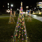 Holiday lights glow on the upper quad.