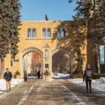 Students walk out of the Arches on a cold winter day. Mark Brown/University of St. Thomas