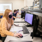 Students in professor Chong Xu’s electrical engineering class work with their partners virtually during the lab portion of class. LIam James Doyle/University of St. Thomas