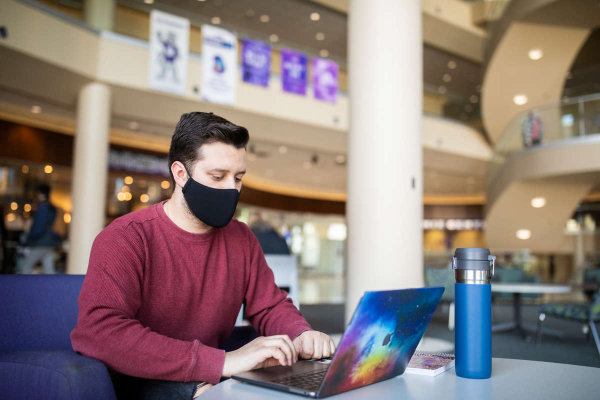 Noah Becker, freshman and member of Undergraduate Student Government (USG), participates in a virtual USG senate meeting in the Anderson Student Center on March 4, 2021.