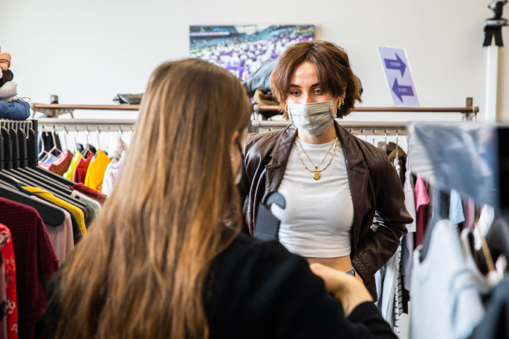 Co-founder Payton Filipiak, right, and volunteer Grace McAlees-Callanan at Tommie's Closet. Mark Brown/University of St. Thomas