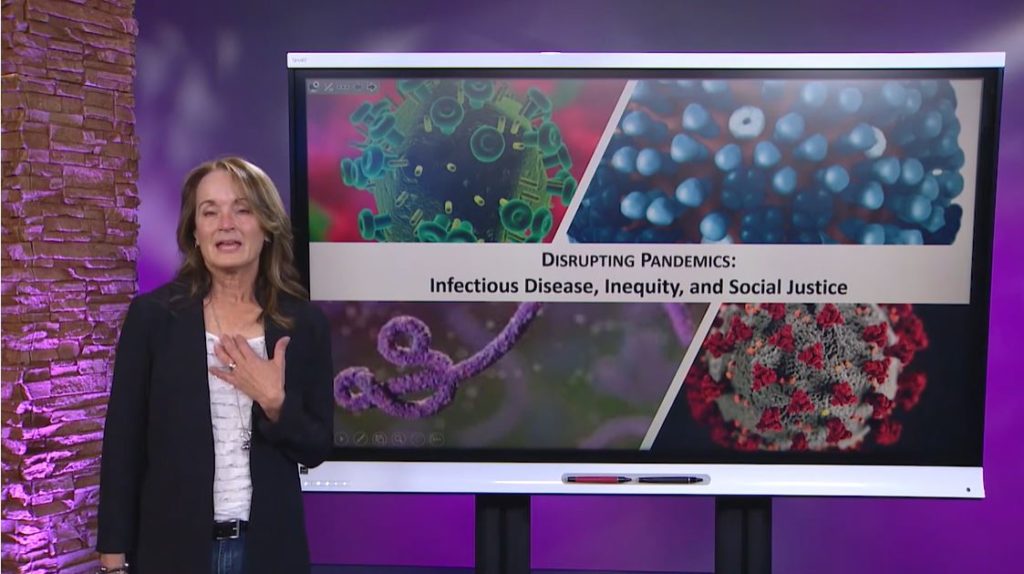 Biology professor Jill Manske giving a presentation on disrupting pandemics.