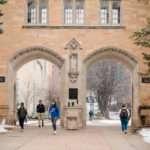 Students walk through The Arches after a snowfall. Mark Brown/University of St. Thomas