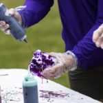 Students make tie dye shirts during Tommie Fest. Mark Brown/University of St. Thomas