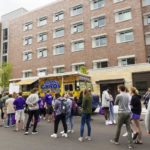 Students get food from food trucks in the Tommie East Parking lot. Mark Brown/University of St. Thomas