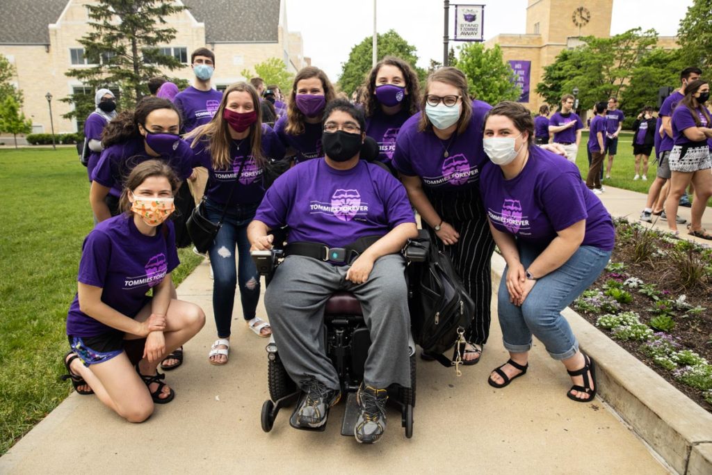 Students pose for a photo during the annual March Out of the Arches event. Mark Brown/University of St. Thomas