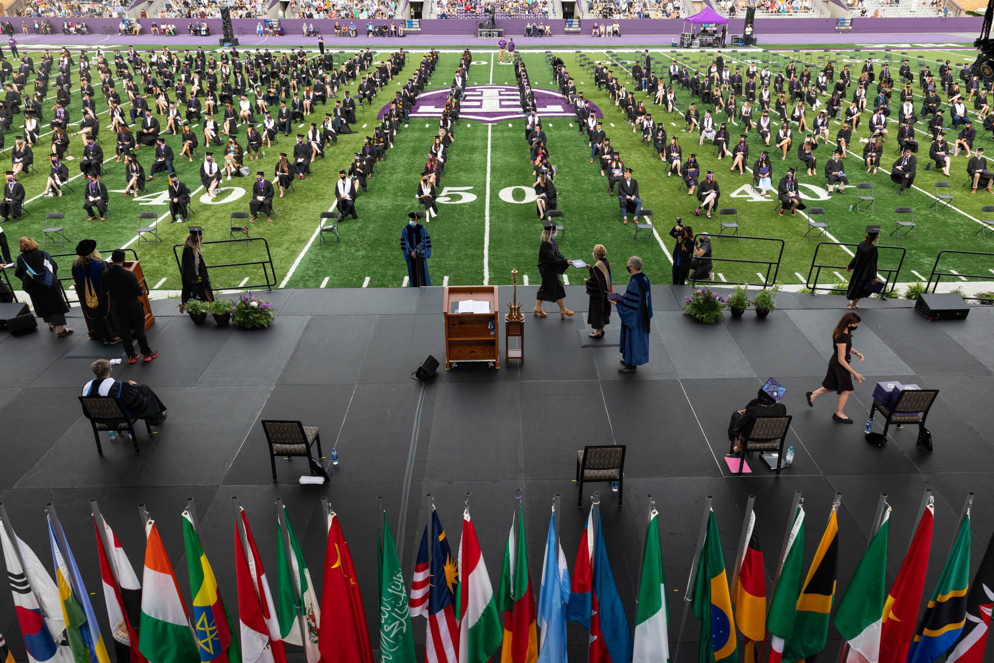 President Sullivan hands out diplomas during the 9am commencement ceremony in O’Shaughnessy Stadium in St. Paul on May 22, 2021.