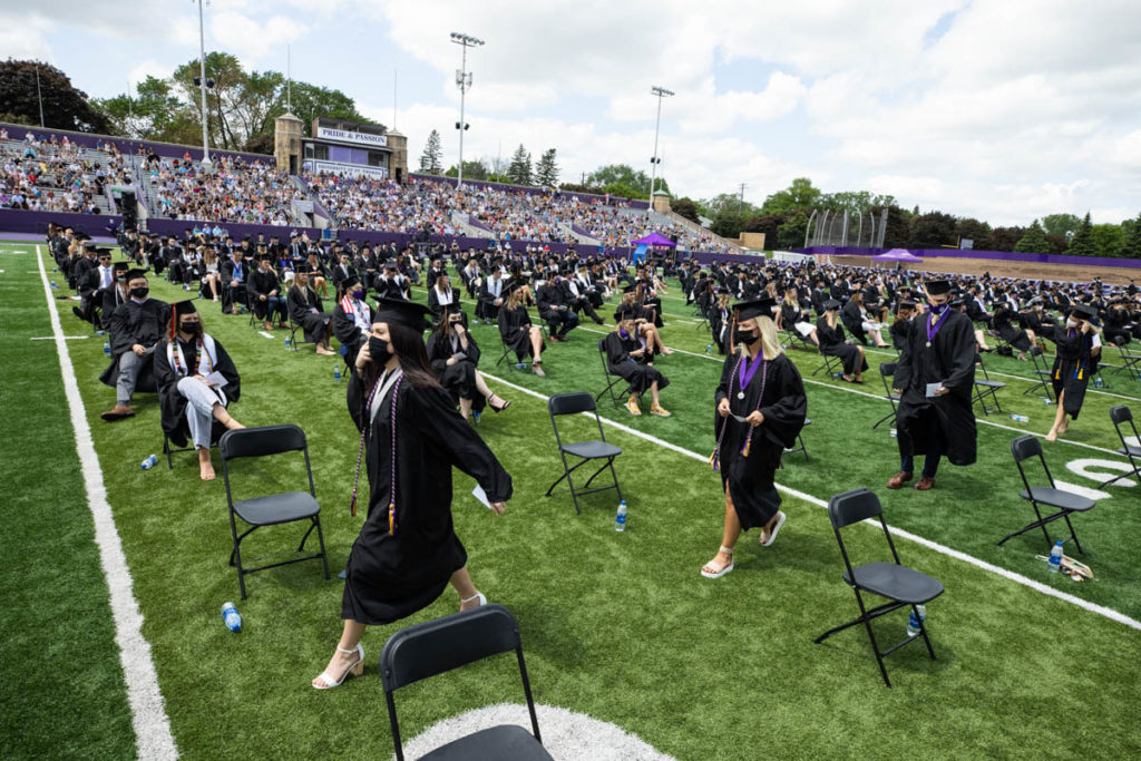 Students attend the Opus College of Business undergraduate commencement ceremony. Mark Brown/University of St. Thomas