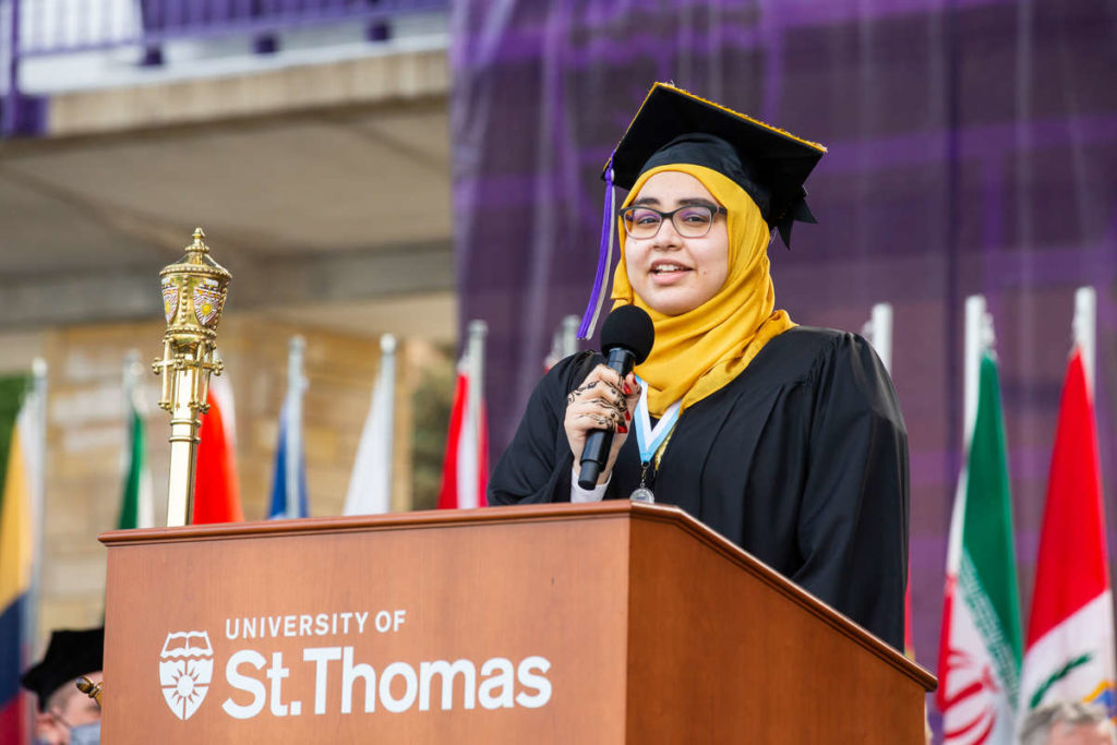 Commencement speaker Aiesha Osman speaks to her fellow students during the Dougherty Family College commencement ceremony. Liam James Doyle/University of St. Thomas