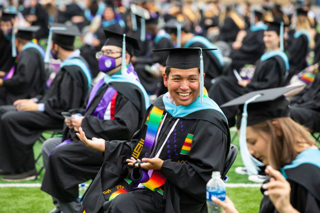 Students attend the graduate commencement ceremony. Liam James Doyle/University of St. Thomas