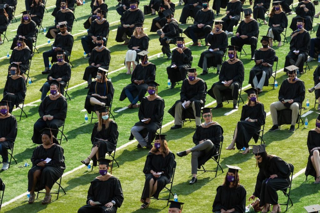 Students attend the commencement ceremony for graduate programs in the Opus College of Business and School of Engineering. Mark Brown/University of St. Thomas