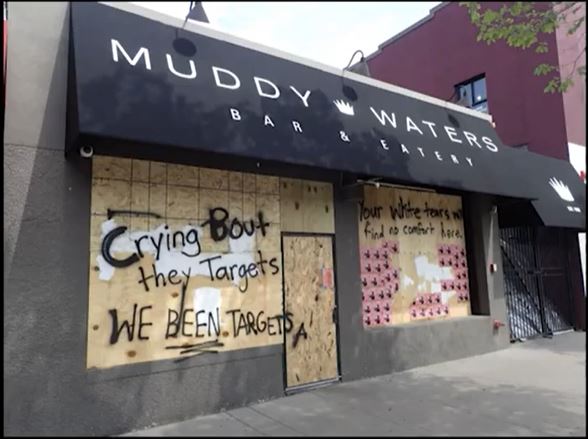 Graffiti on Muddy Waters - text " crying bout they targets, we been targets"