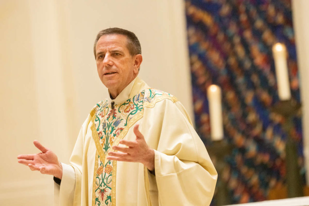 Father Chris Collins, incoming Vice President for Mission, during a Holy Thursday mass in the Chapel of St. Thomas Aquinas