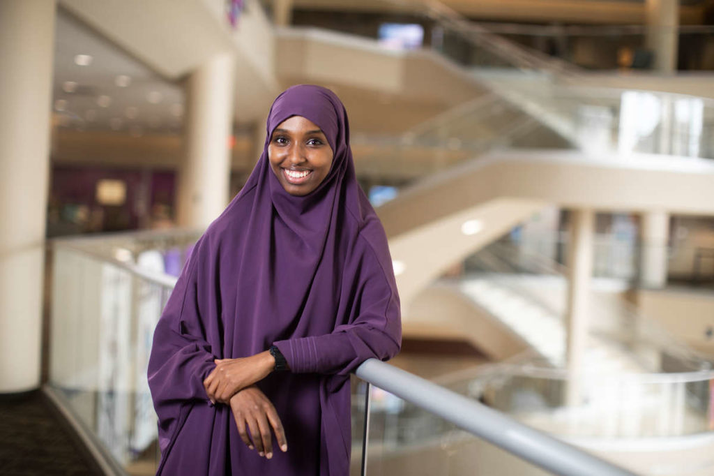 Senior Sahra M. Mohamud stands for a portrait inside of the Anderson Student Center
