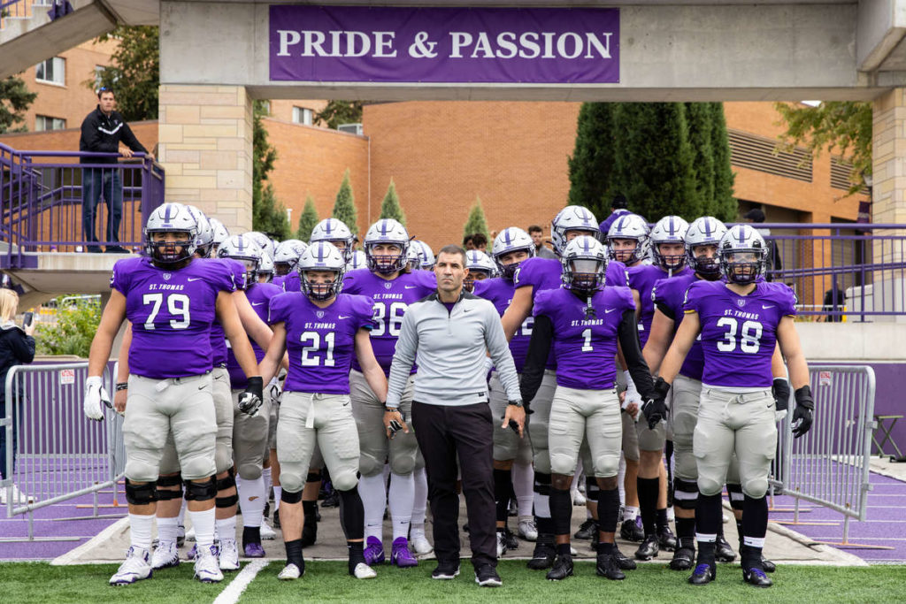 Glenn Caruso with football team.