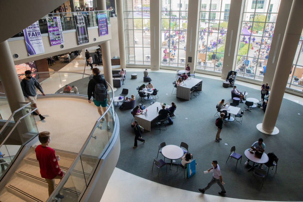 Students pass through the main atrium space of the Anderson Student Center in St. Paul on September 21, 2021.