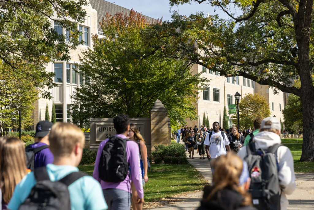 Students walk from the Anderson Student Center on a beautiful early fall day on the St. Paul campus on September 29, 2021. Mark Brown/University of St. Thomas