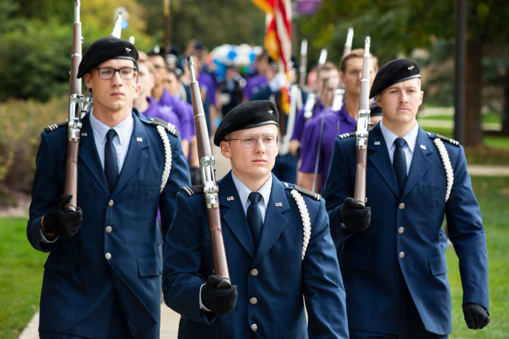 Members of the University of St. Thomas’ ROTC detachment march during the Homecoming Parade. Liam James Doyle/University of St. Thomas