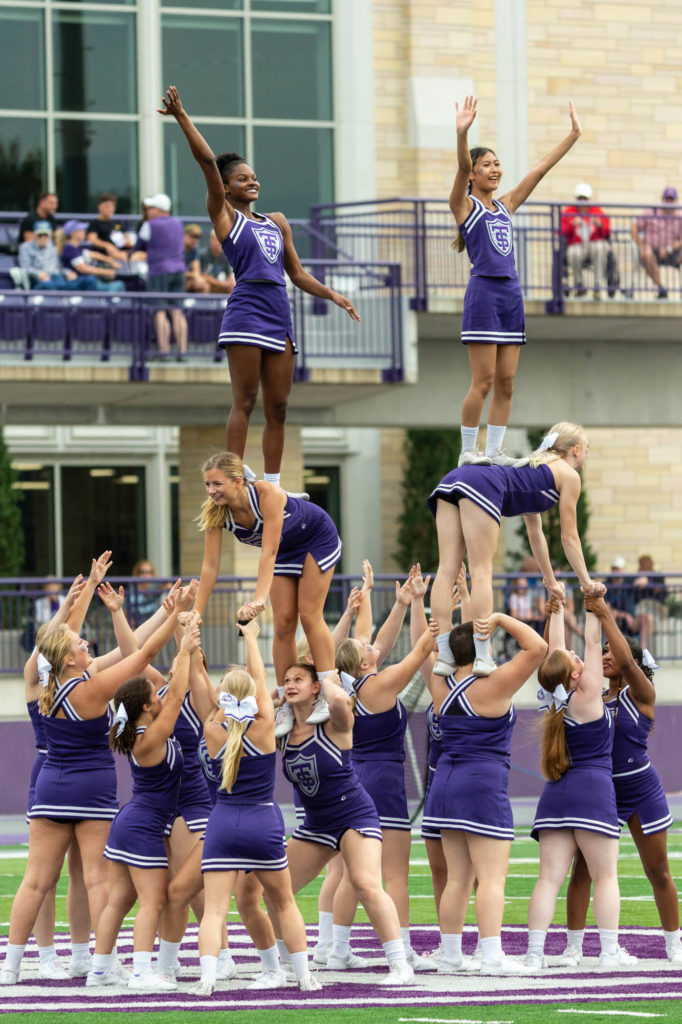 The Cheerleading Team performs at halftime. Mark Brown/University of St. Thomas