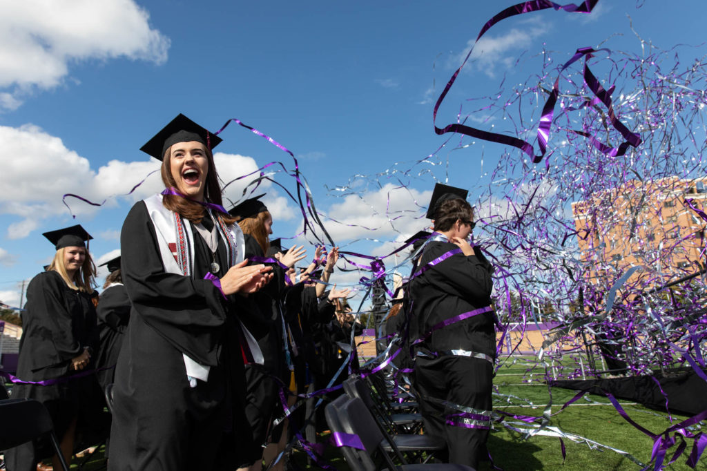 Students celebrate as confetti streamers fly during a commencement ceremony in O’Shaughnessy Stadium on October 10, 2021, in St. Paul. The graduation ceremony was finally celebrated after being canceled in 2020 due to the COVID-19 pandemic.