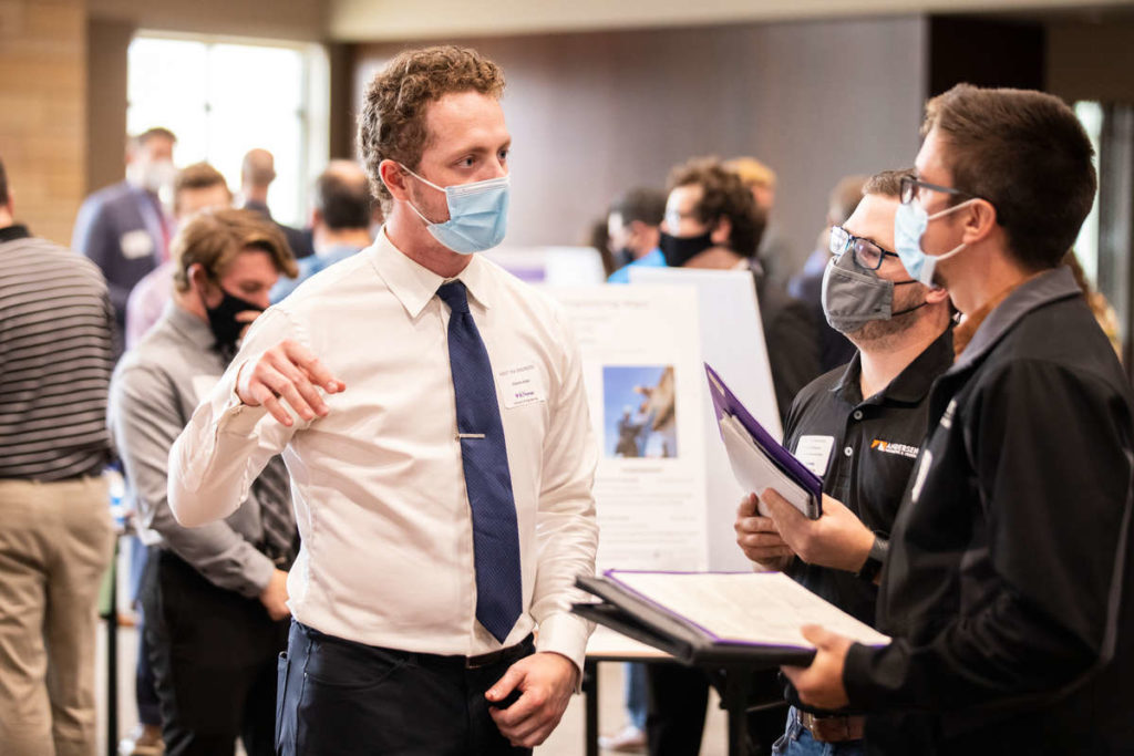 School of Engineering students engage with industry professionals during the Meet the Engineers reverse career fair event in the James B. Woulfe Alumni Hall in the Anderson Student Center on October 13, 2021, in St. Paul.