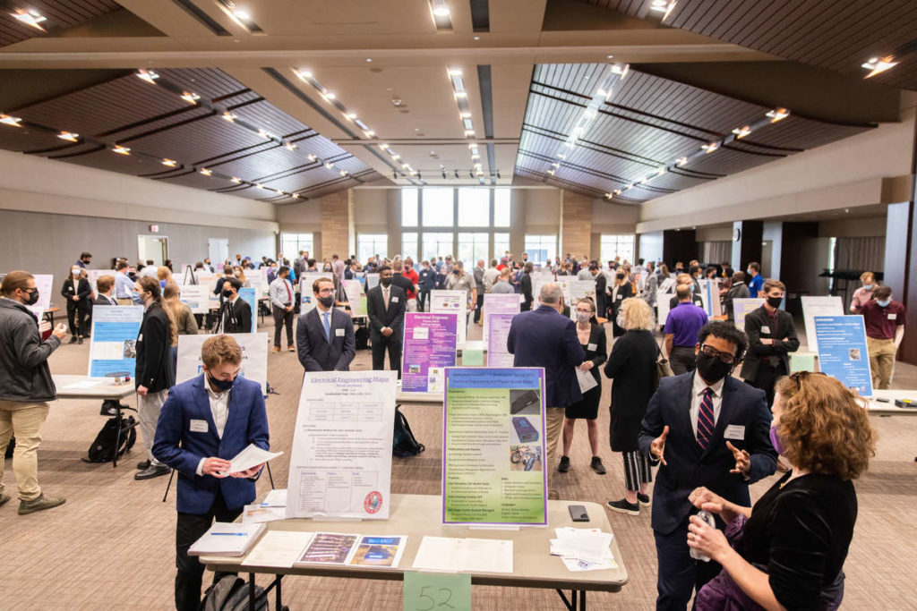 School of Engineering students engage with industry professionals during the Meet the Engineers reverse career fair event in the James B. Woulfe Alumni Hall in the Anderson Student Center on October 13, 2021, in St. Paul.