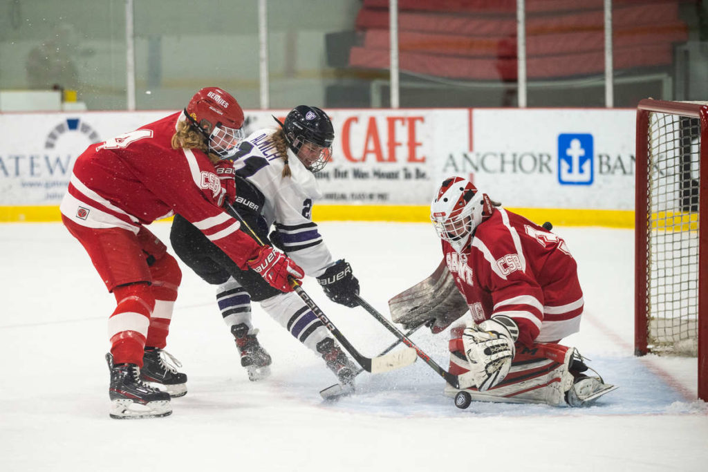 Maija Almich fires a shot on goal during the University of St. Thomas Women's Hockey Team game against the College of Saint Benedict in February, 2021. Mark Brown/University of St. Thomas