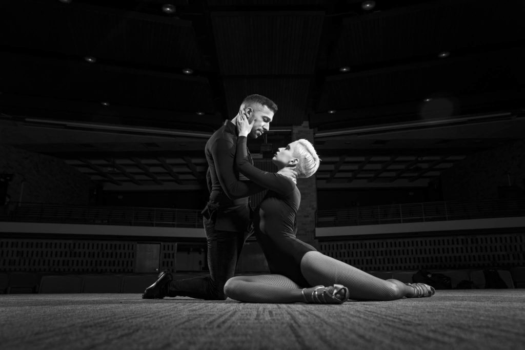Joel Gallegos performs with dance partner Claire Honerman on December 14, 2021, in St. Paul. Gallegos is a math professor at the Dougherty Family College.