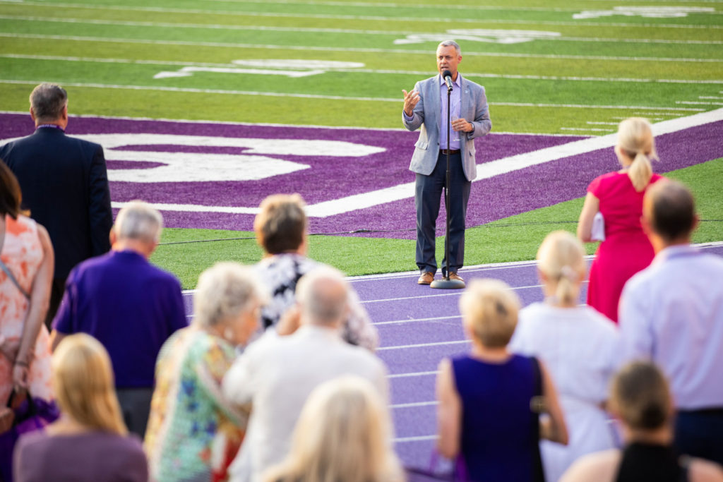 Director of Athletics Phil Esten speaks during the conclusion of the university’s Division I launch party outside in O’Shaughnessy Stadium. Liam James Doyle/University of St. Thomas