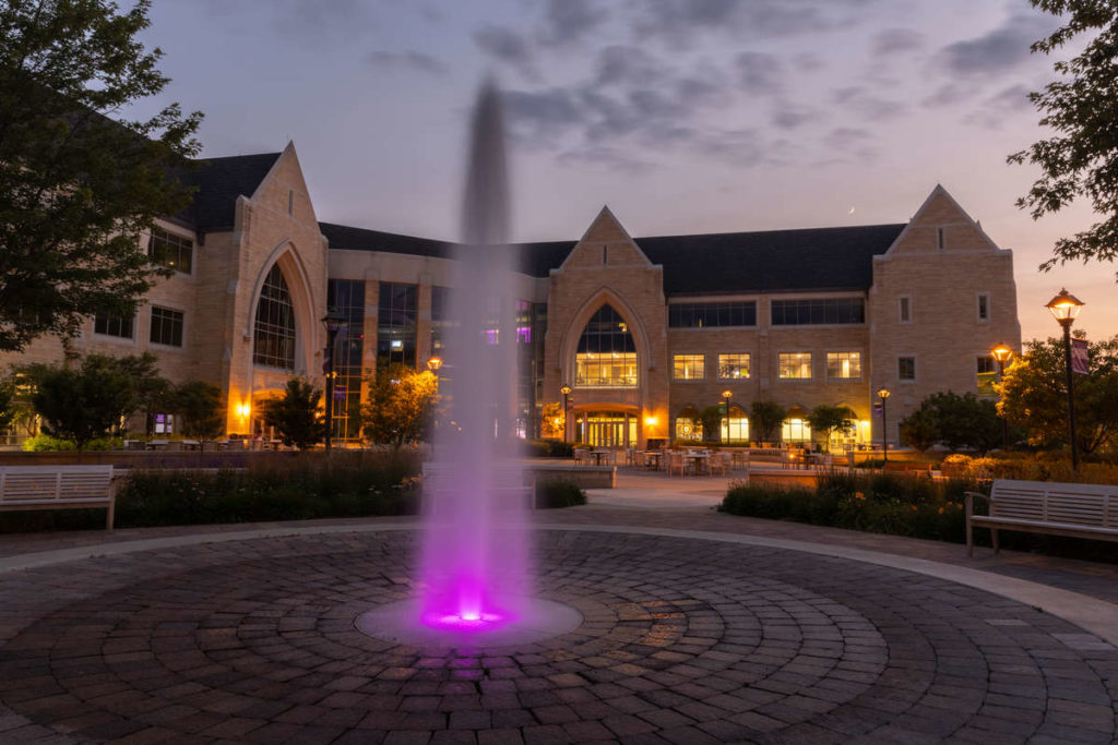 The Anderson Student Center and Harpole Fountain and Monahan Plaza at dusk on July 12, 2021 in St. Paul.