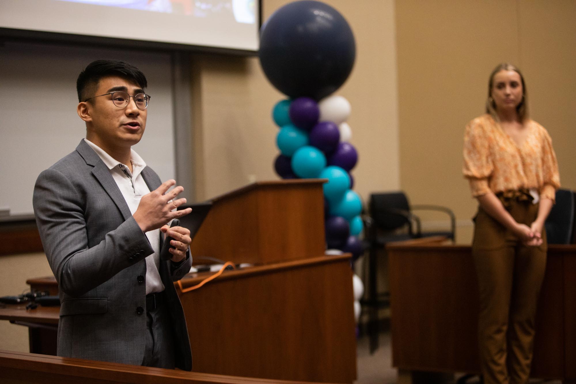 Hao Taing and Jamie Tjornehoj of Local4Local pitch during the Fowler Global Social Innovation Challenge in Schulze Hall on April 22, 2022, in Minneapolis.