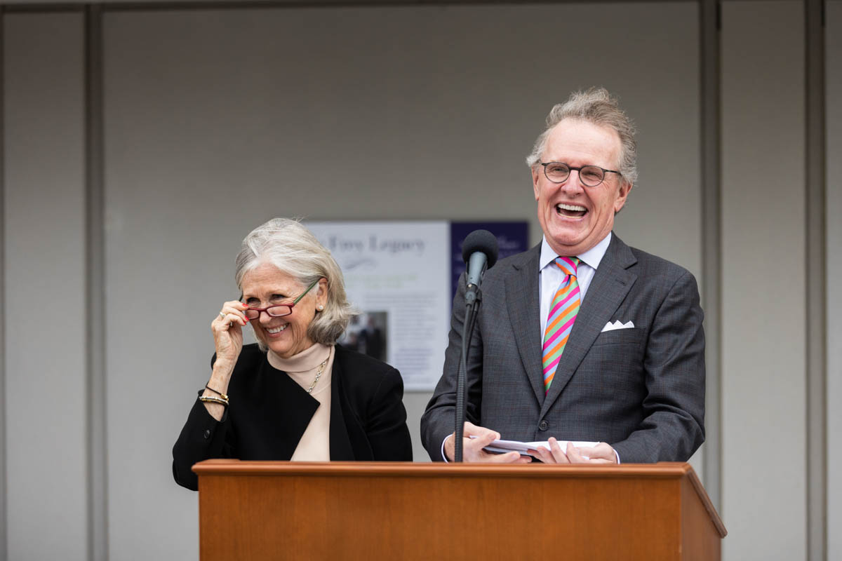 Board of Trustees Chairman Pat Ryan and his wife, Ann, laugh during an event celebrating the Frey Room and Board Grants gift in front of the newly renamed Mary and Gene Frey Hall (formerly Tommie East) on May 11, 2022 in St. Paul.