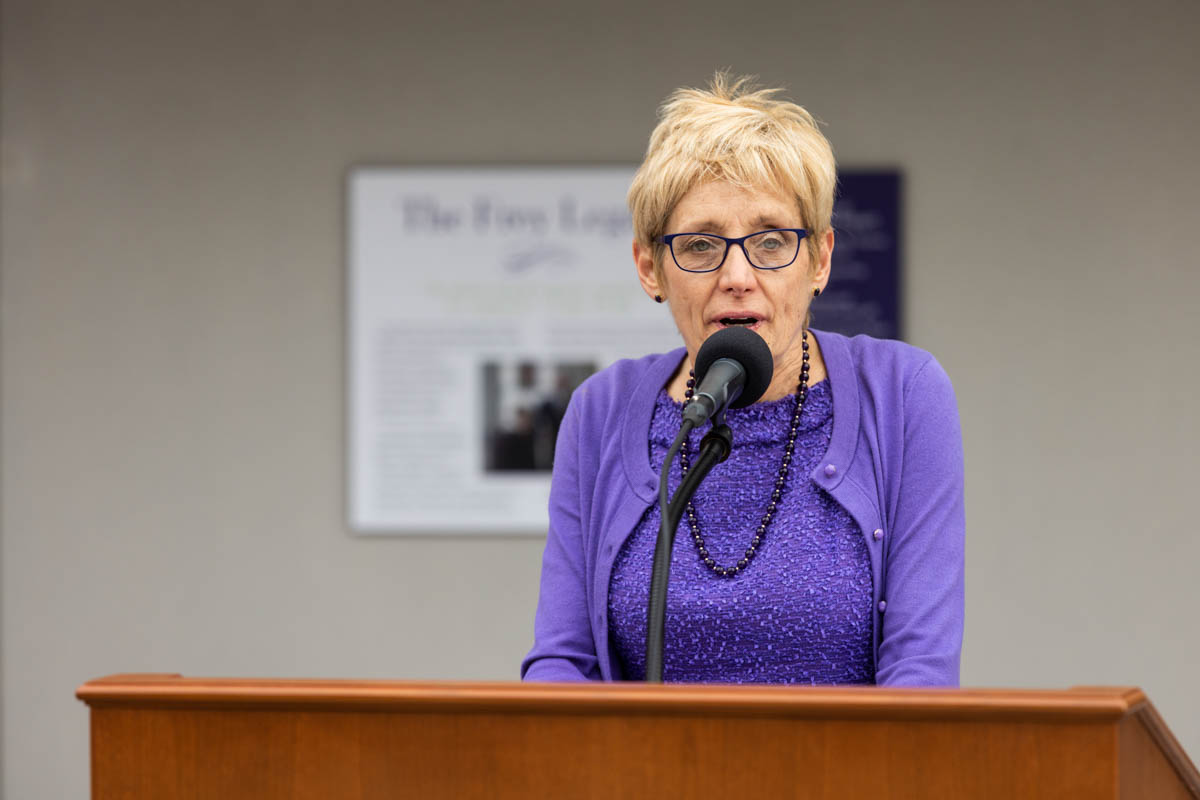 President Julie Sullivan speaks during an event celebrating the Frey Room and Board Grants gift in front of the newly renamed Mary and Gene Frey Hall (formerly Tommie East) on May 11, 2022 in St. Paul.
