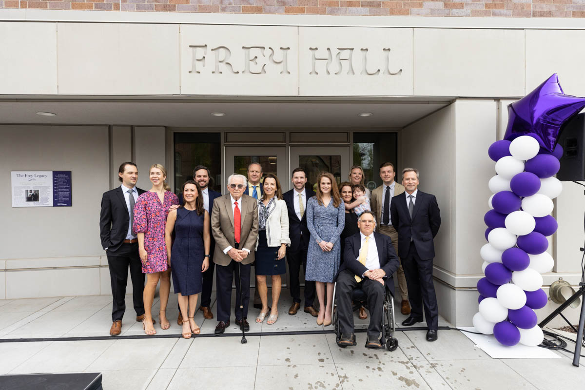 The Frey family poses for a photo during an event celebrating the Frey Room and Board Grants gift in front of the newly renamed Mary and Gene Frey Hall (formerly Tommie East) on May 11, 2022 in St. Paul.