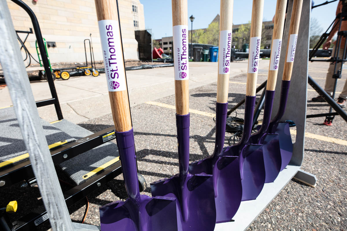Shovels stand in a rack during a groundbreaking ceremony for the Schoenecker Center on May 12, 2022, in St. Paul in the parking lot where the new building will be located on south campus.