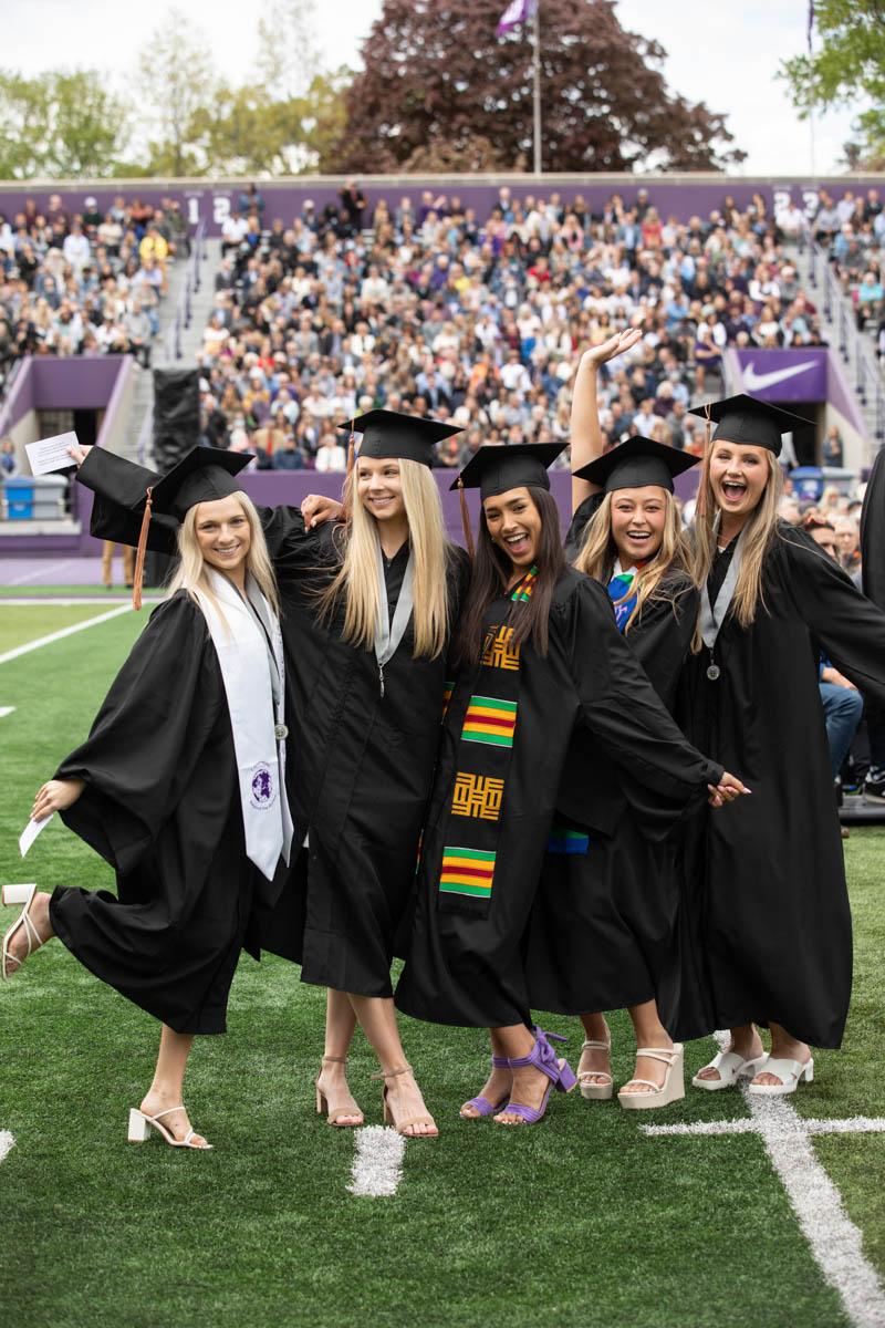 Students celebrate during the 2022 Undergraduate Commencement Ceremony for the Opus College of Business on May 21, 2022, in St. Paul.
