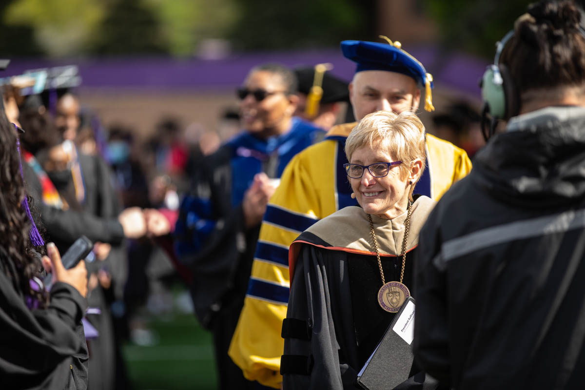 Julie Sullivan congratulates students during the 2022 Undergraduate Commencement Ceremony for the Dougherty Family College on May 22, 2022, in St. Paul.