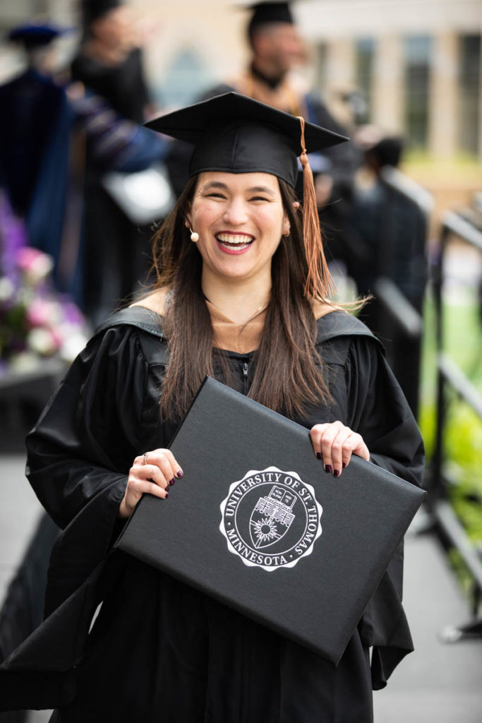 Student Rebecca Trudeau during the 2022 Graduate Commencement ceremony for the Opus College of Business, the School of Education and the School of Divinity in St. Paul on May 22, 2022.