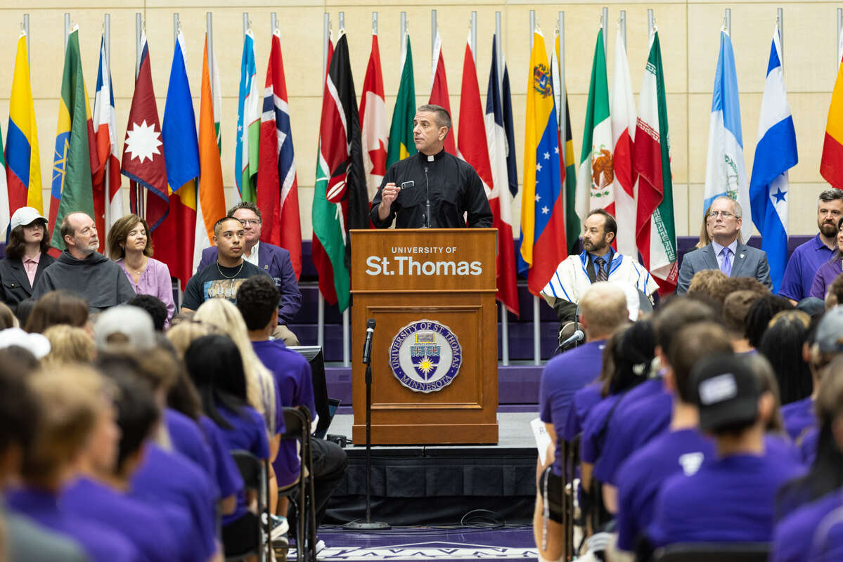 Father Chris Collins speaks during the Welcoming Assembly and Interfaith Blessing for the class of 2026. Mark Brown/University of St. Thomas