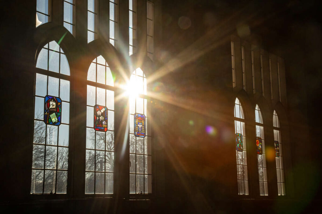 The sun shines through windows in the O’Shaughnessy-Frey Library great room on a cold winter morning. Mark Brown/University of St. Thomas