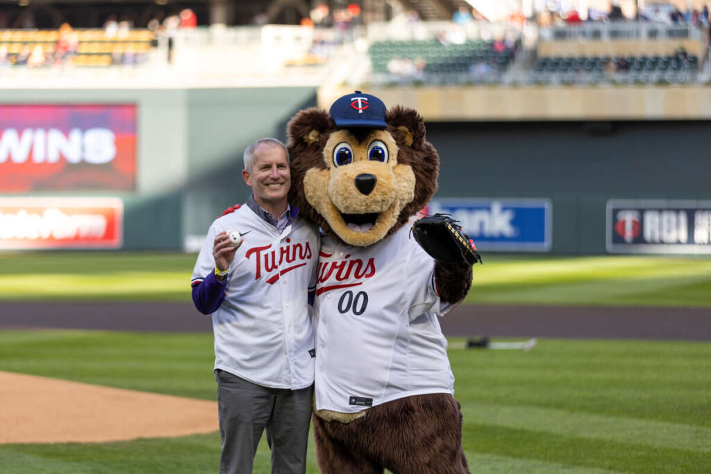 President Vischer and T.C. Bear at St. Thomas night at the Minnesota Twins At Target Field on April 25, 2023, in St. Paul. Brandon Woller/University of St. Thomas