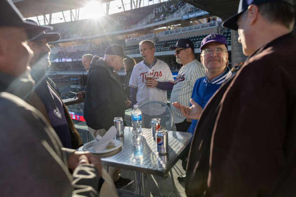 President Vischer and others at St. Thomas night at the Minnesota Twins At Target Field. Brandon Woller/University of St. Thomas