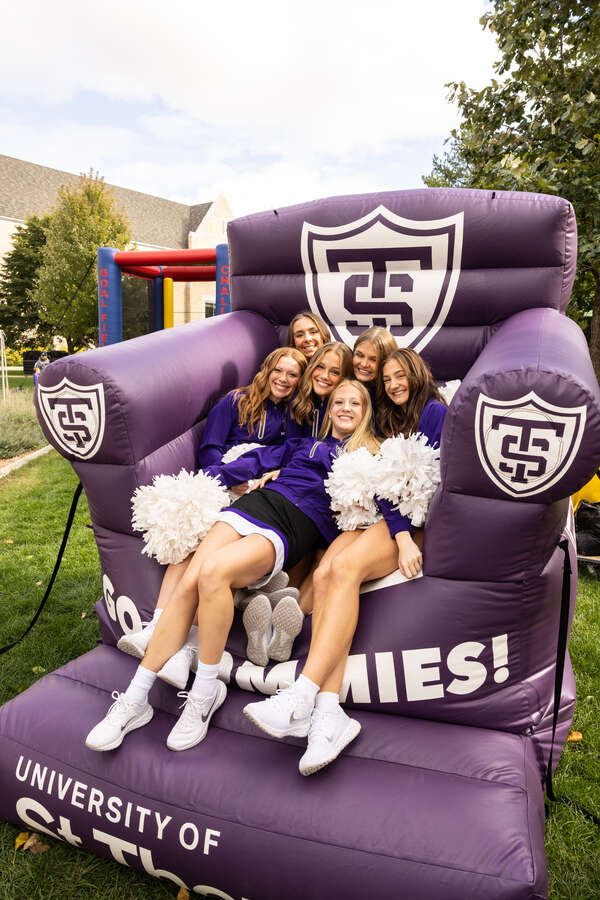 Students on an inflatable chair.