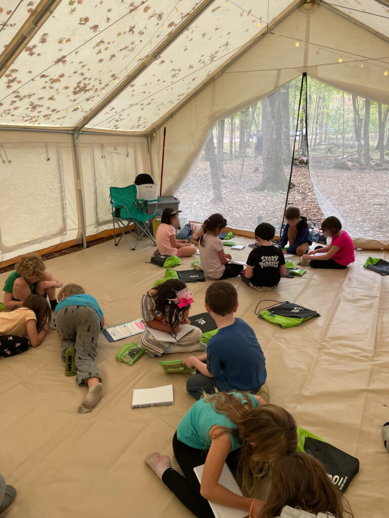 Pupils learning in yurt