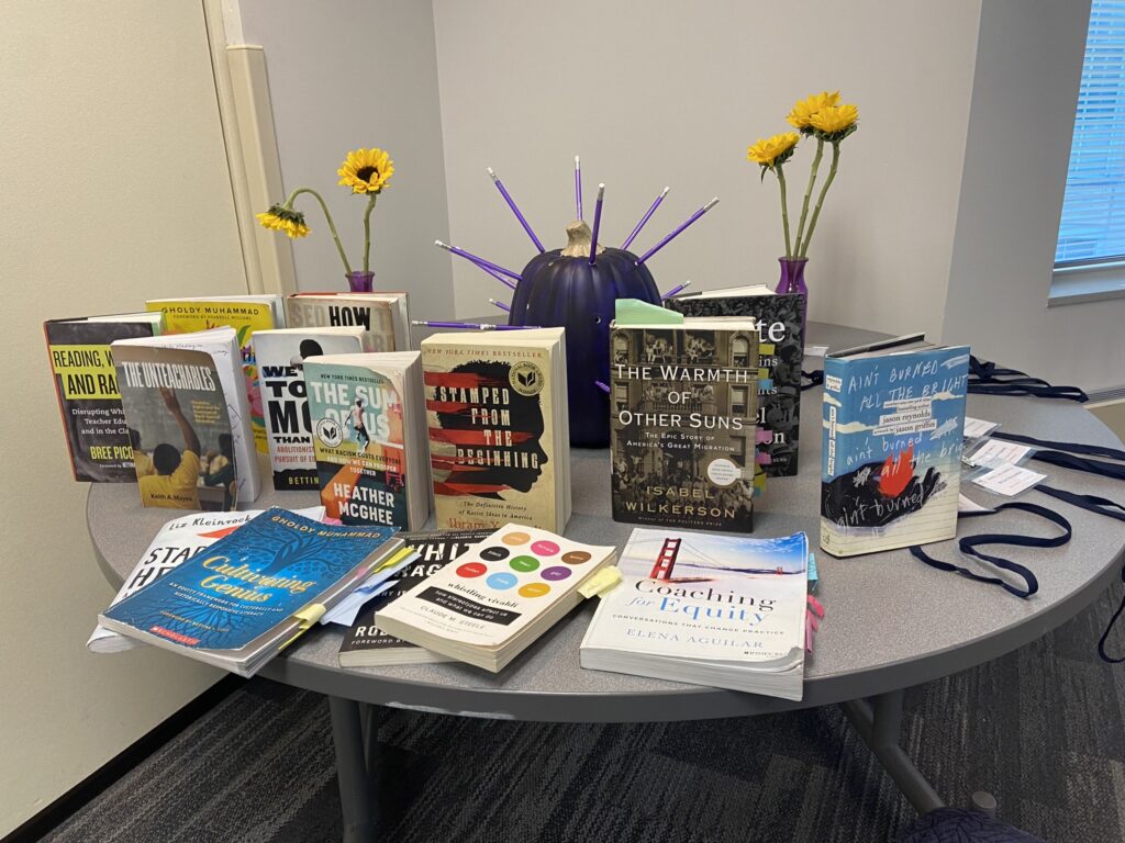 Books about education on a table.