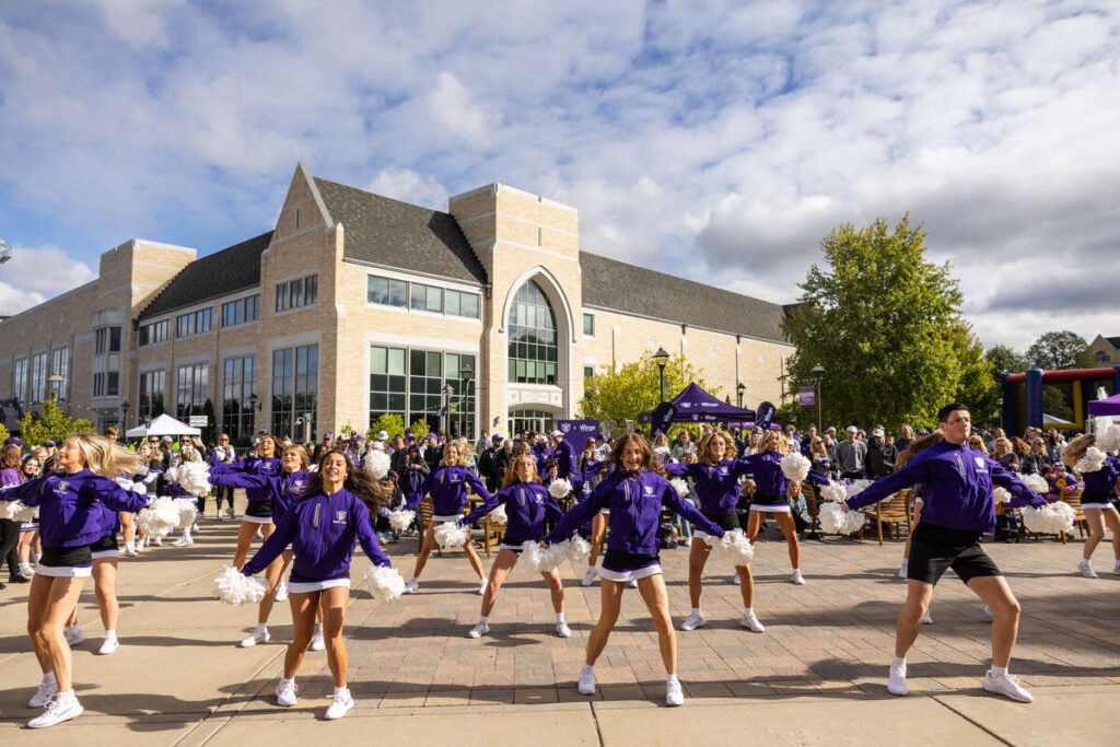 The Dance Team performs during Purple on the Plaza before the Homecoming Football Game on the St. Paul campus on October 7, 2023.