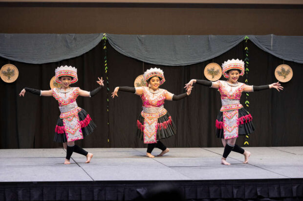 Performers at the Hmong New Year - Roots of Modernity in Woulfe Hall on December 2, 2023, in St. Paul.
